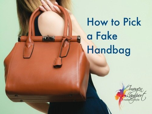 Elegant outfit. Brown leather bag in female hand