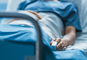 Woman in Hospital Bed
