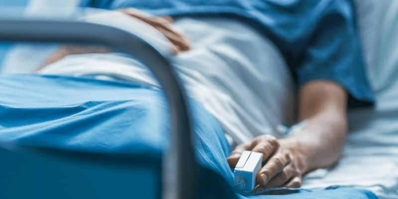 Breast Reduction Surgery Recovery Guide Woman in Hospital Bed