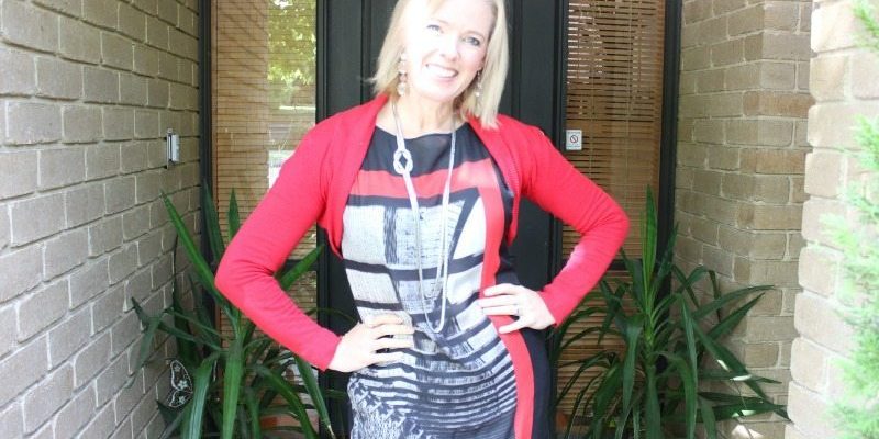 wearing leggings and a tunic