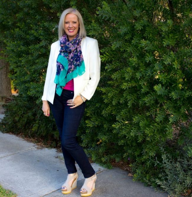 white jacket blue jeans Using a medium colour to create a medium contrast from high