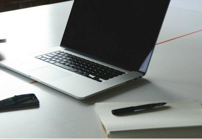 How to look powerful in the workplace when the traditional business colours don't flatter you