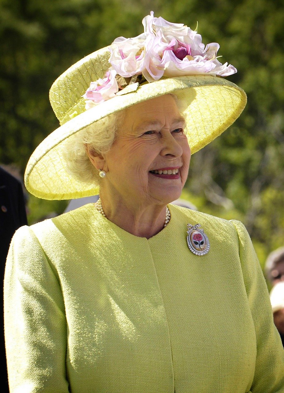 Queen Elizabeth II in yellow-green