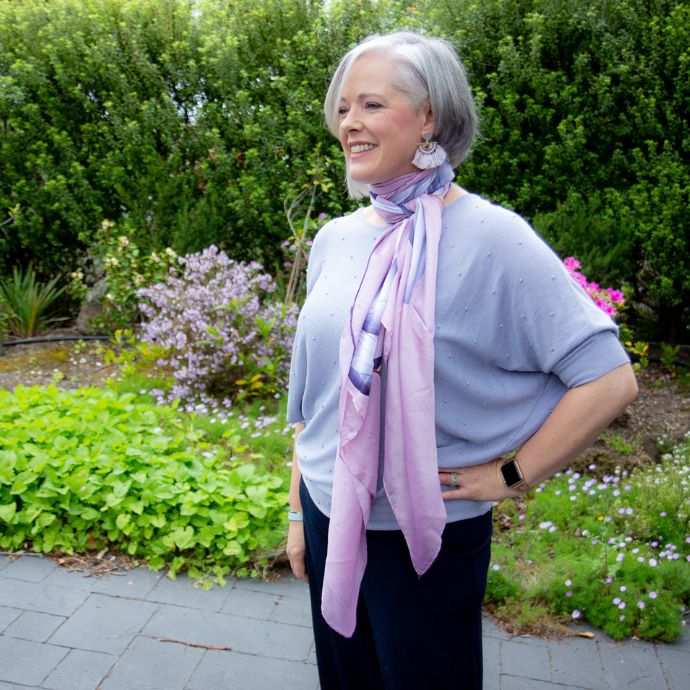 A silk or satin scarf is more formal