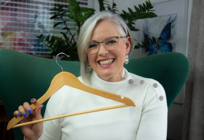 Why Shopping is Not the Answer to Your Style Woes Why Shopping is Not the Answer to Your Style Woes - Imogen Lamport - Inside out style - holding coathanger