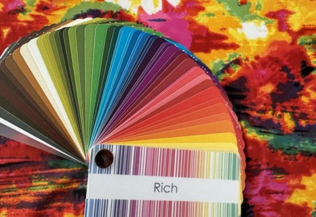 Using your colour analysis swatch palette to pick patterns that contain both warm and cool colours RIch warm colour palette works with this pattern even though there is some cool pink in it because there is predominantly more warm colours