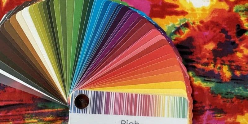 RIch warm colour palette works with this pattern even though there is some cool pink in it because there is predominantly more warm colours